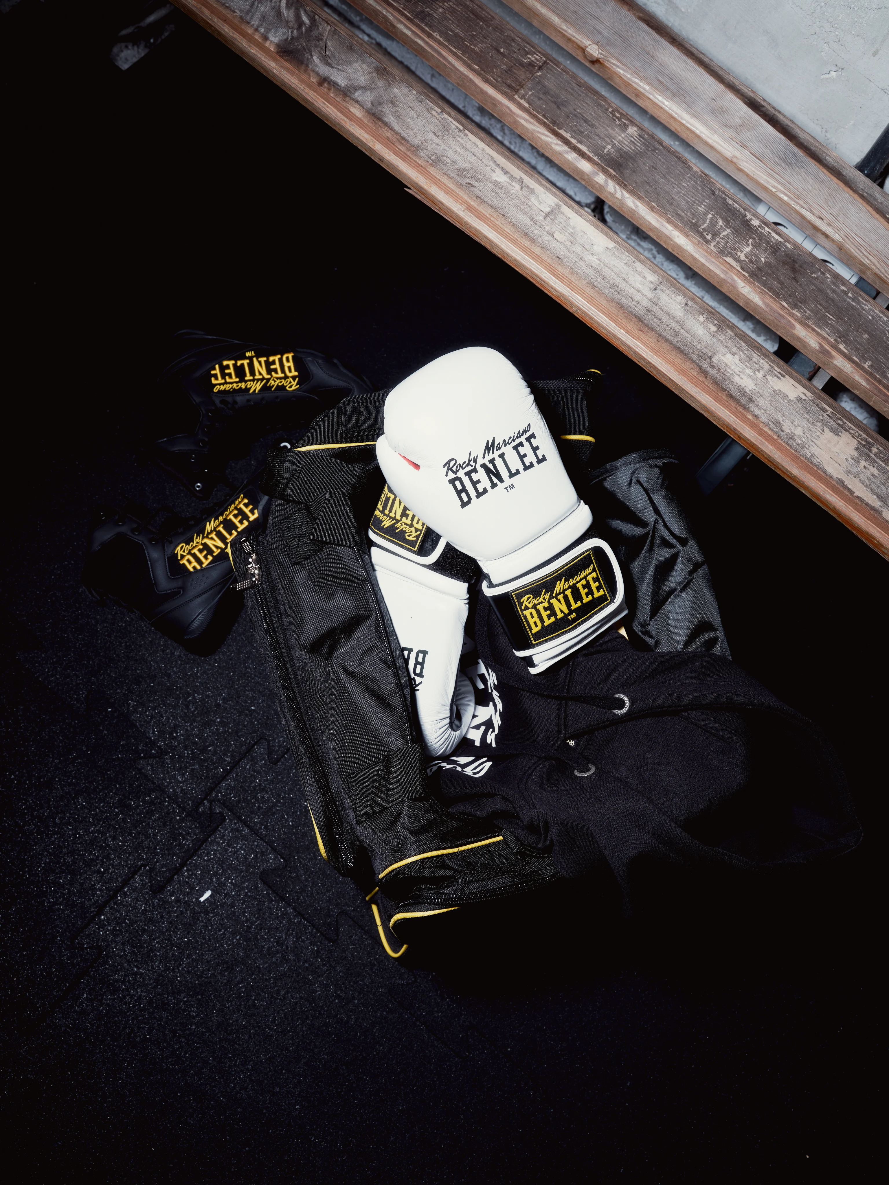 BENLEE gloves and sports bag on the gym floor