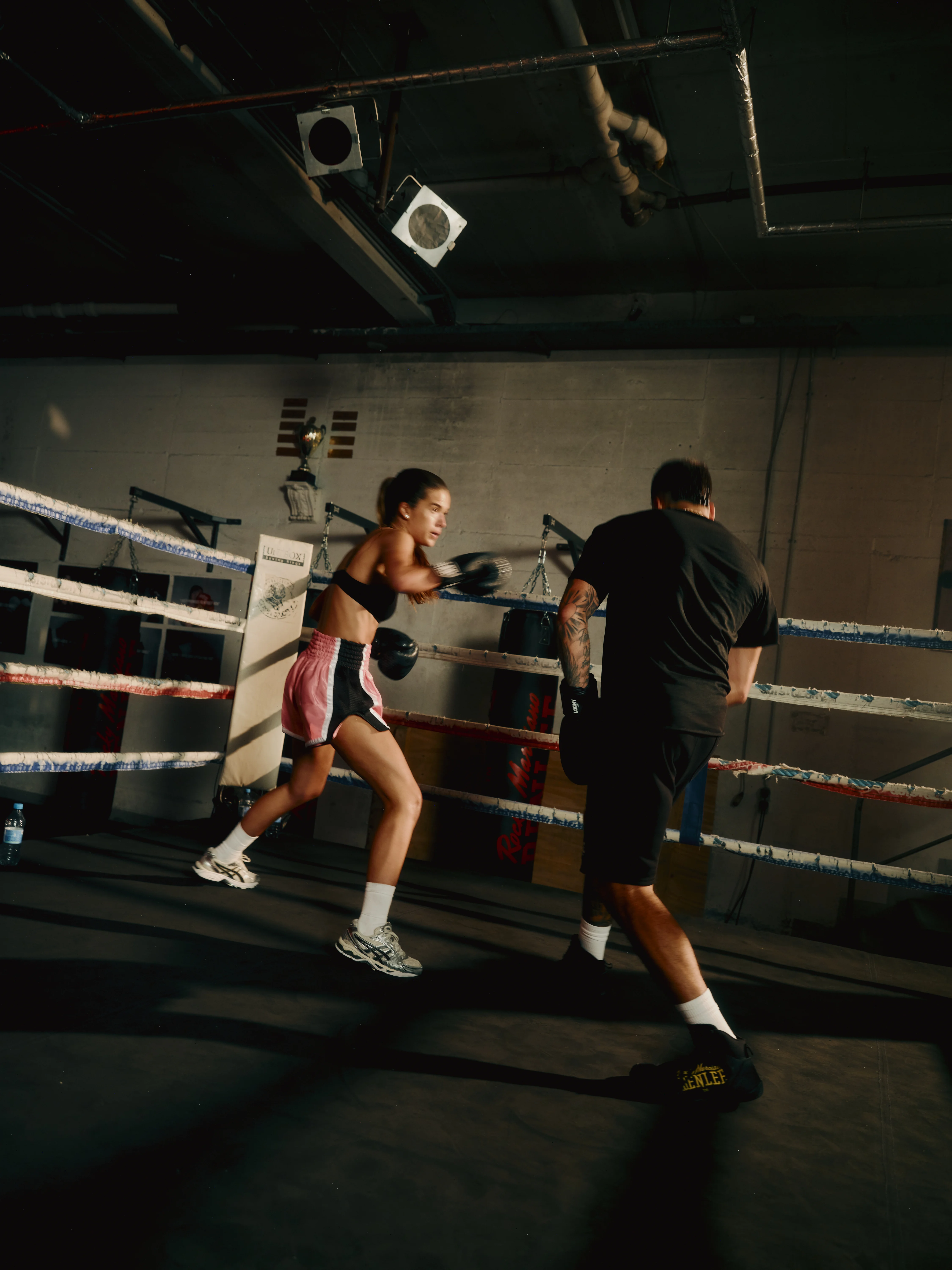 Two boxers sparring in the ring