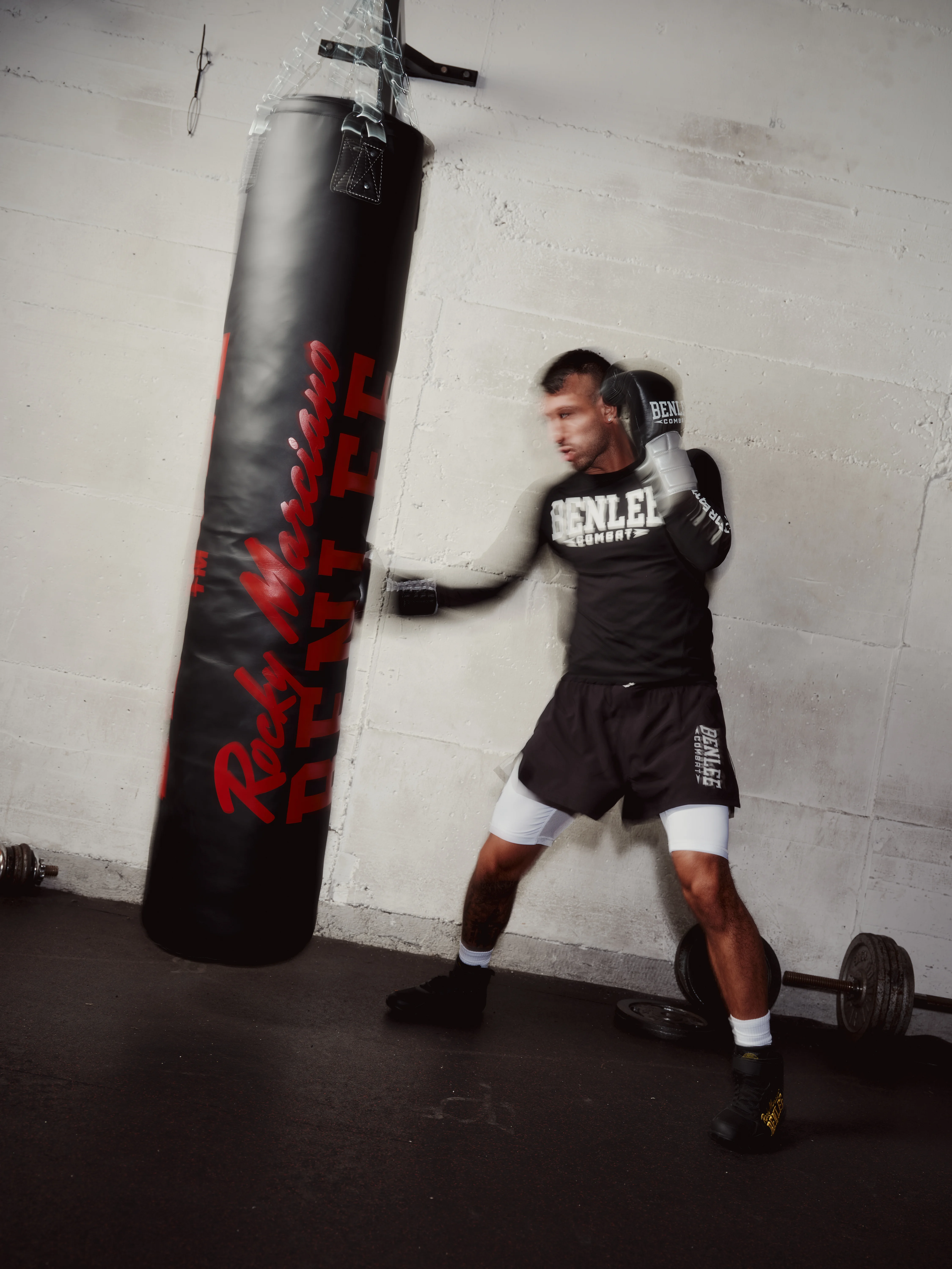 Boxer training at a BENLEE heavy bag