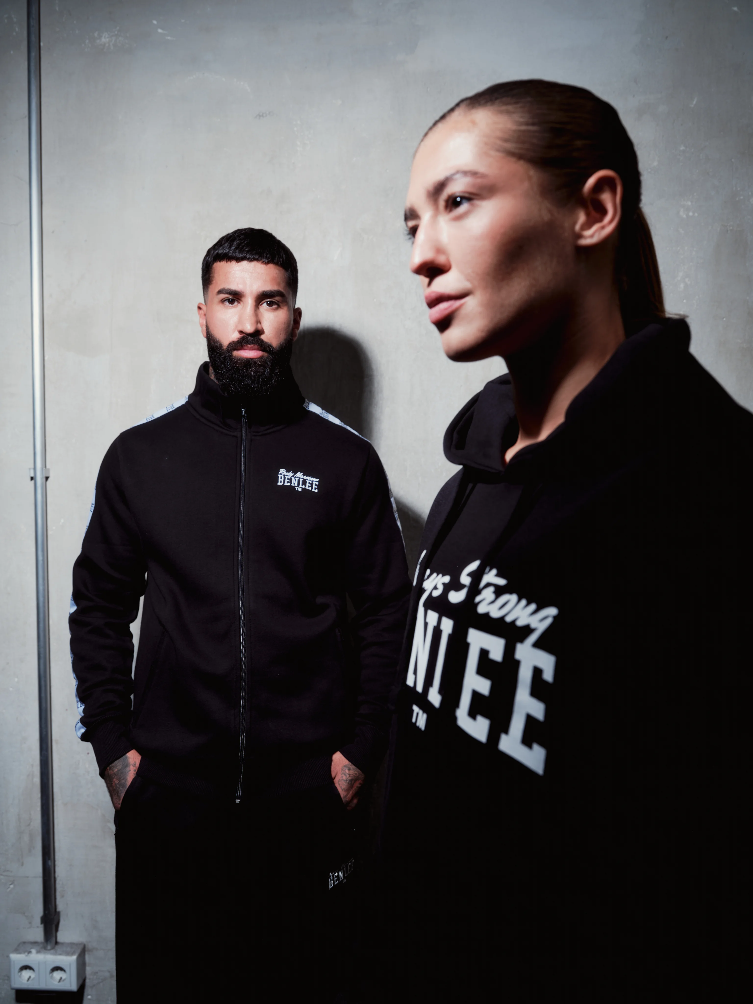 Two boxers in black BENLEE hoodies, close-up