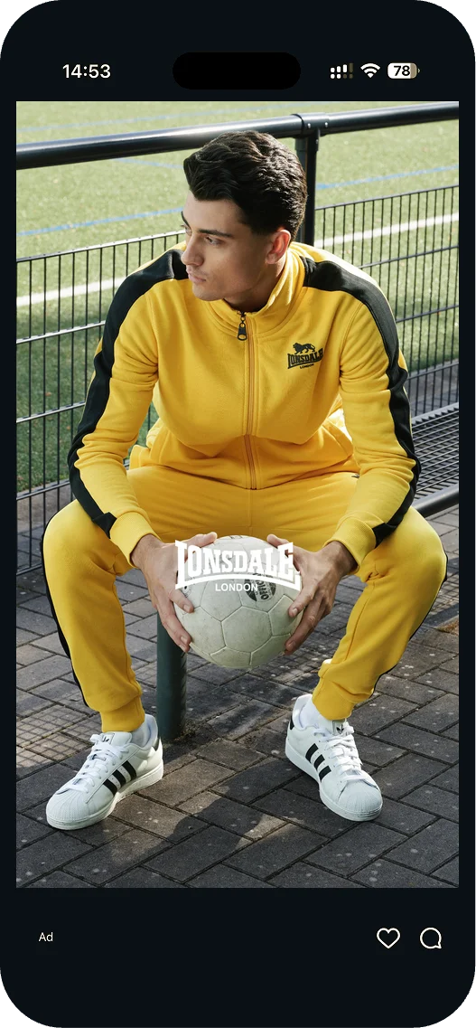 Lonsdale story ad: man in a yellow tracksuit holding a football