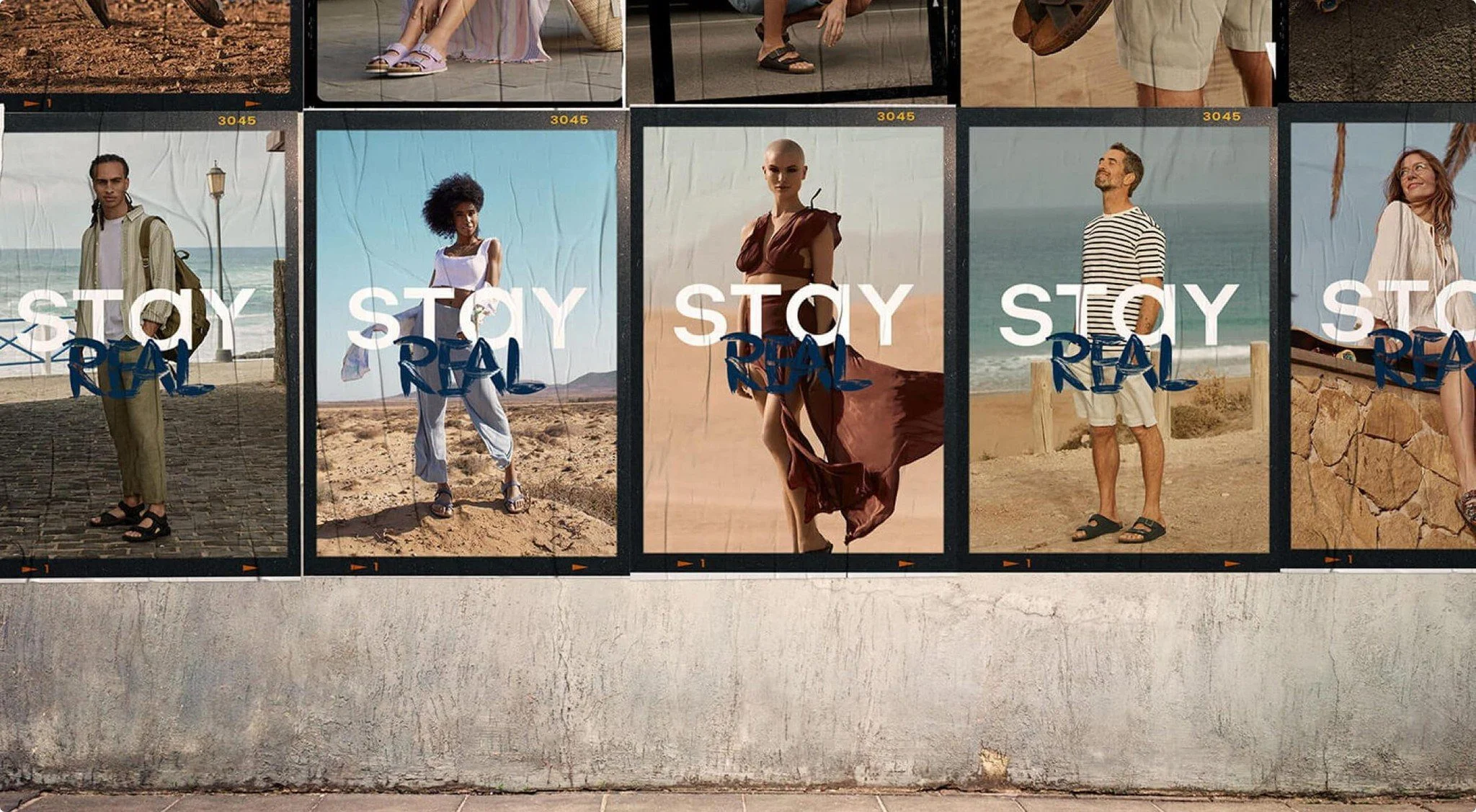Rohde “Stay Real” campaign posters on a wall