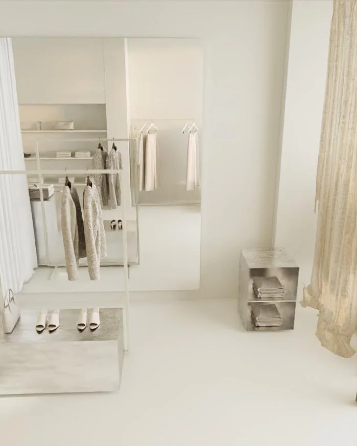 Fitting room with a curtain and a large mirror
