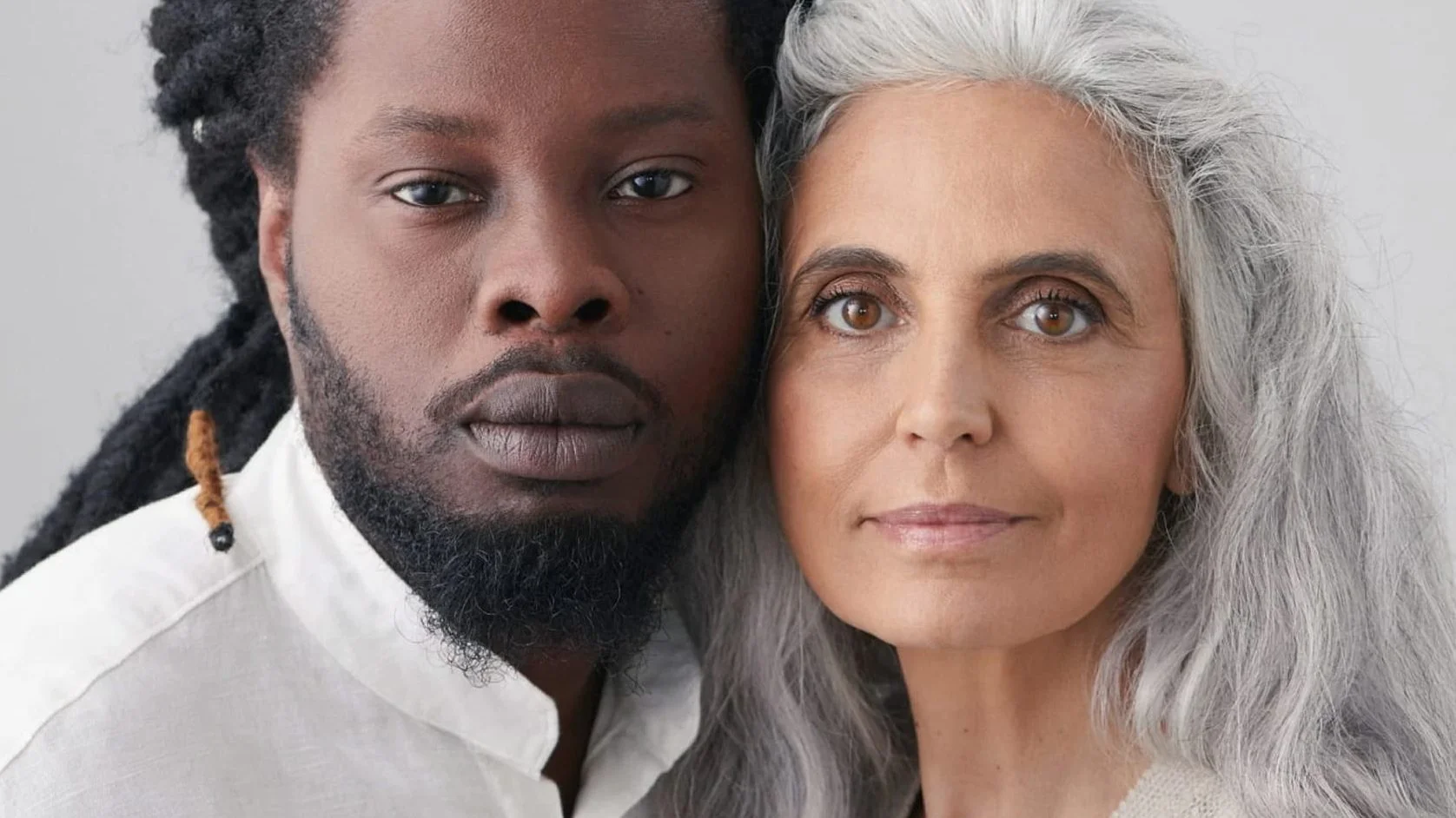 ROHDE campaign: close-up of a bearded man and a grey-haired woman, cheek to cheek