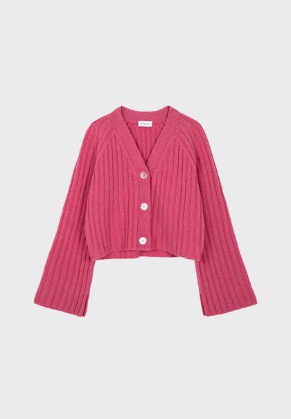 Pink ribbed knit cropped cardigan with three white buttons