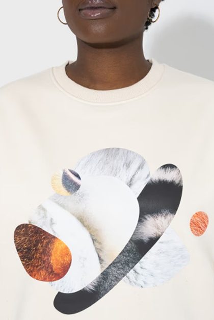 Cream sweatshirt with graphic print