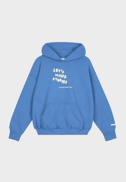 Blue hoodie with “Let’s make stories” text