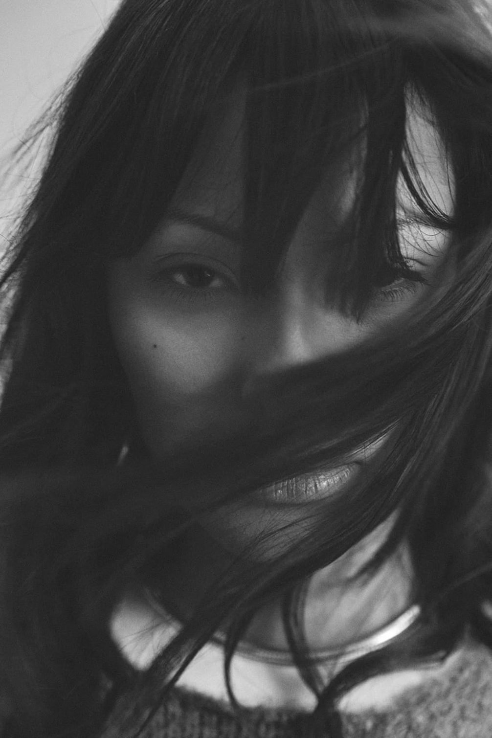 Black and white close-up of a woman's face