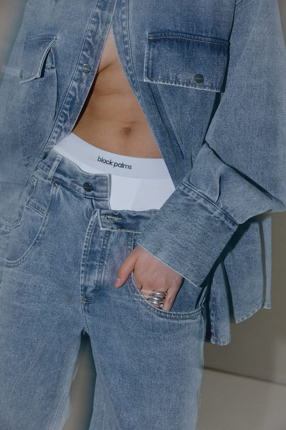 Loose denim look with minimal exposure.