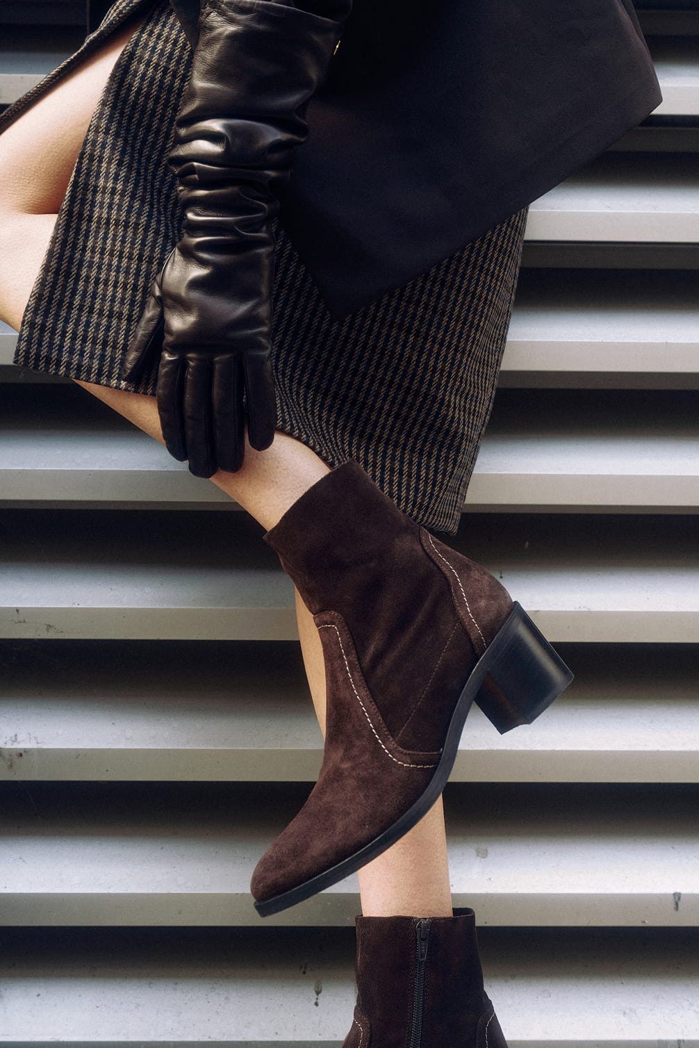 Brown suede boots and leather gloves
