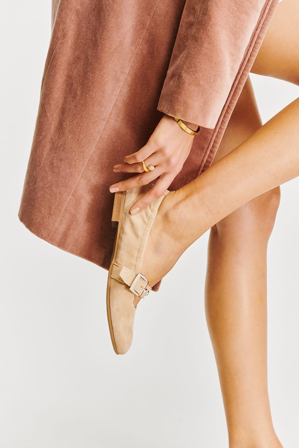 Model putting on a shoe