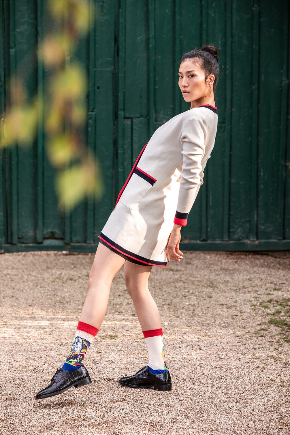 Model in fashion forward dress.