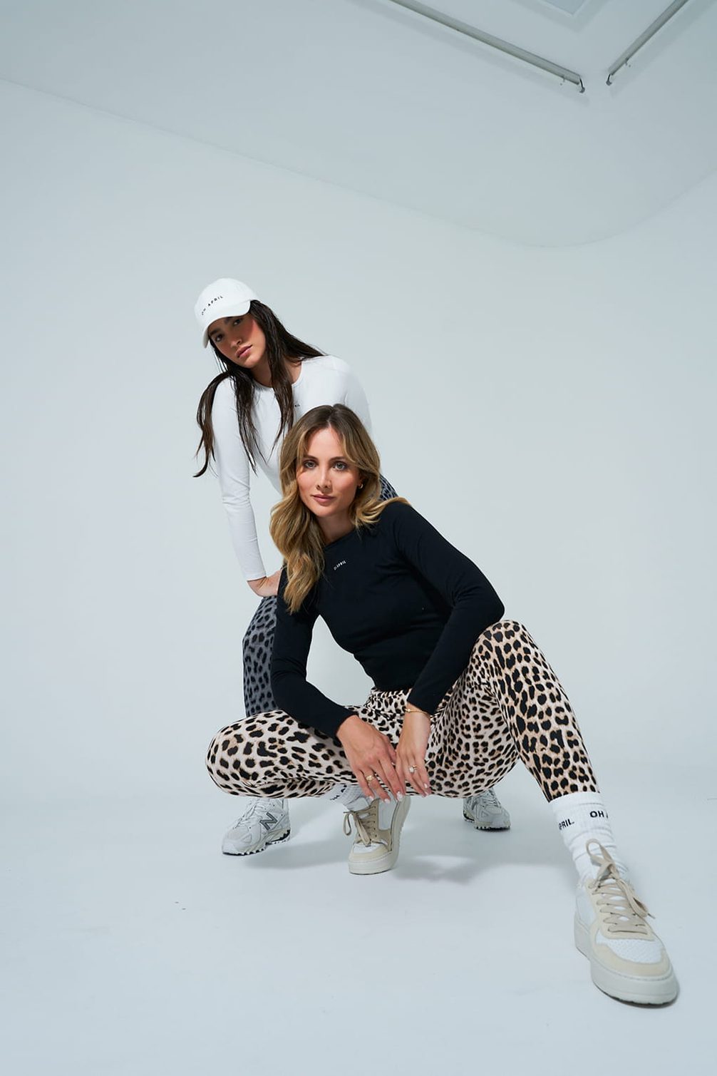 Fashion models showcasing animal print leggings
