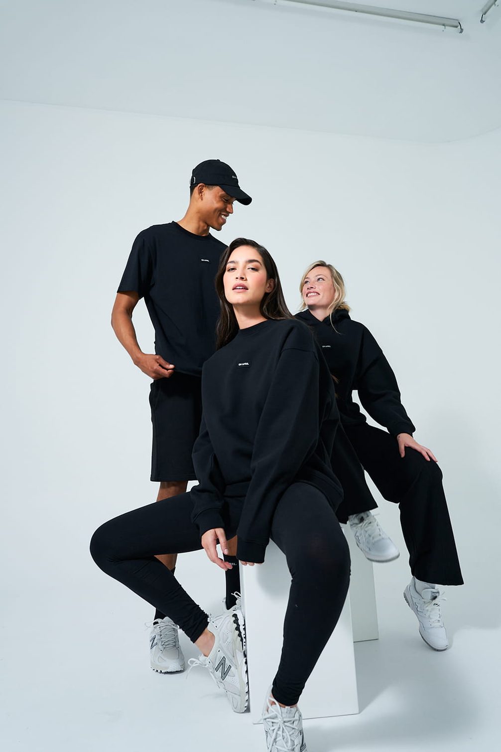 Fashion models in black apparel