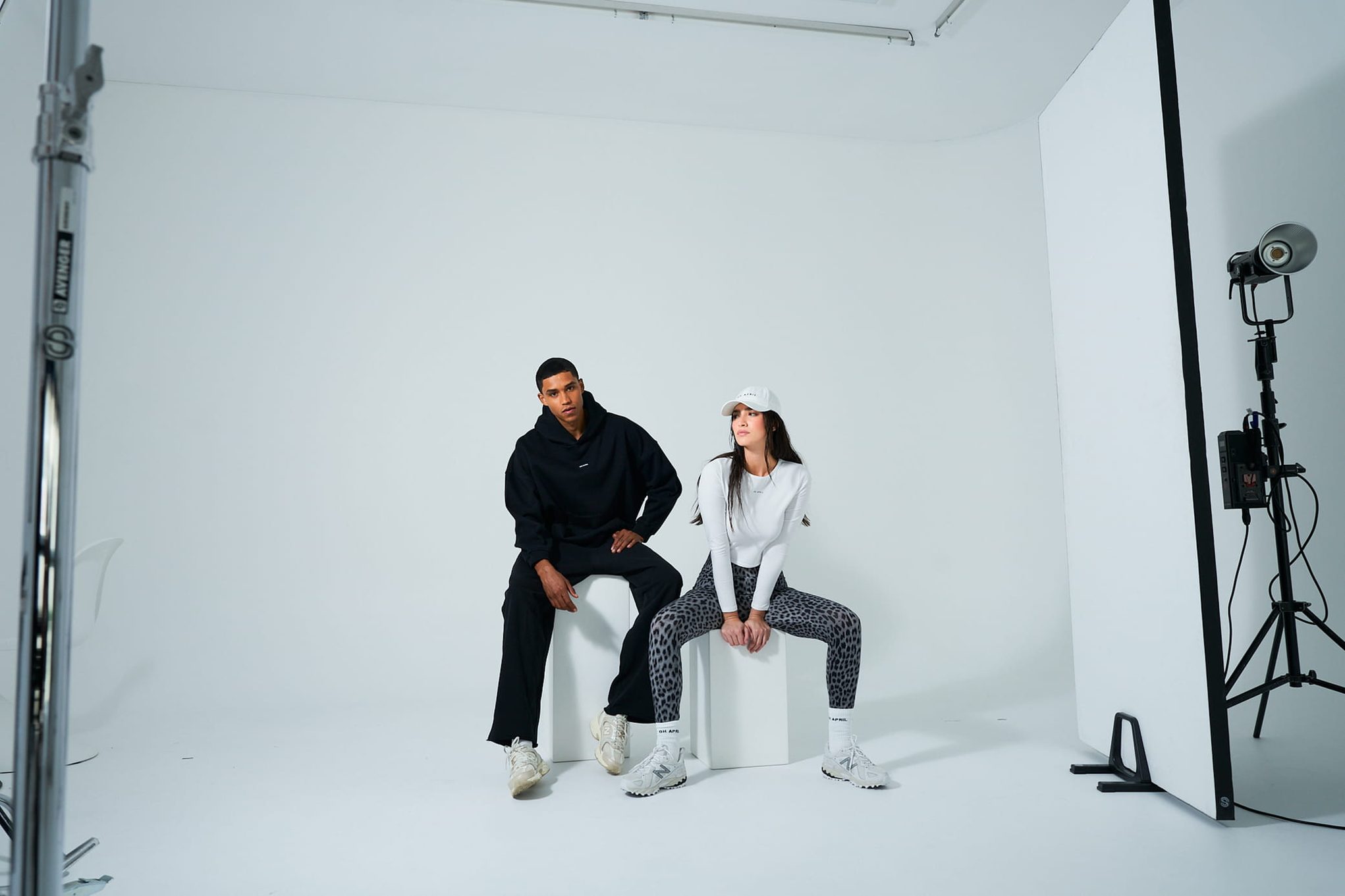 Models in studio with fashion photography equipment