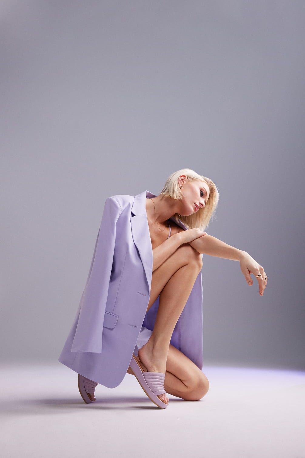 Fashion editorial with model in lilac blazer