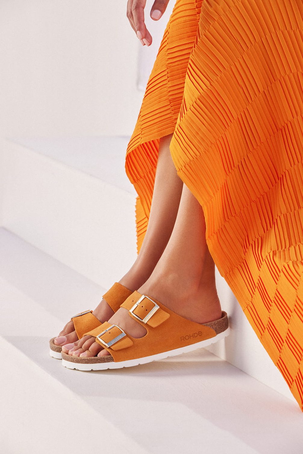 Orange Rohde sandals with pleated skirt.